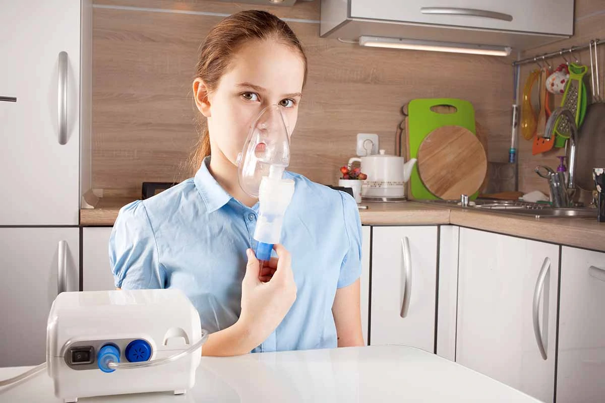 woman nebulizer treatment